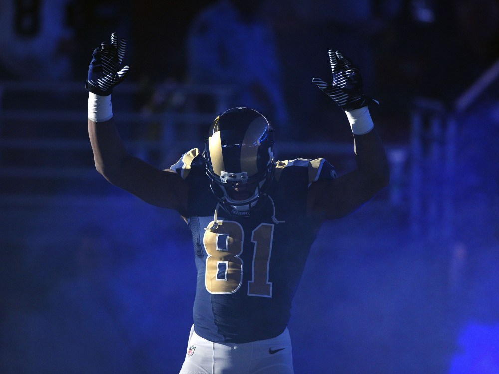 Rams players come out with hands up in pregame intros