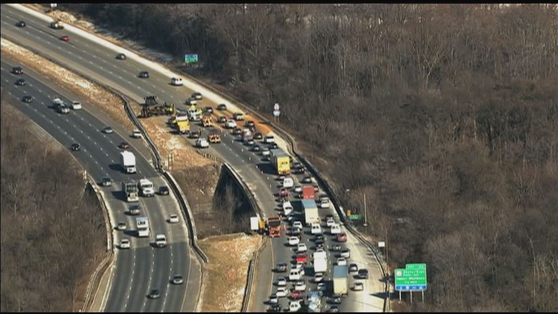 Dump truck overturns on Beltway, lanes closed | wusa9.com