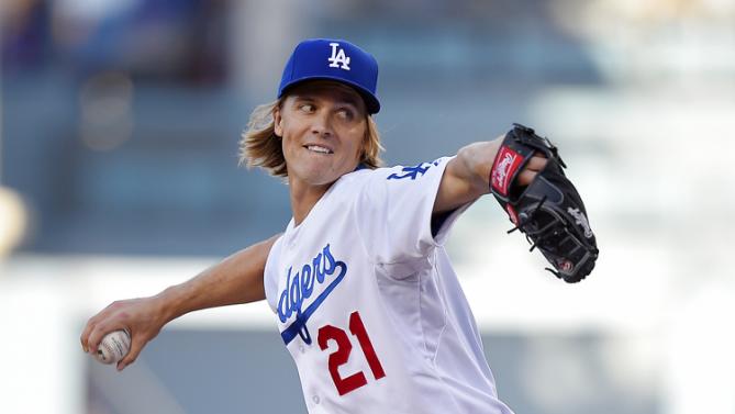 Los Angeles Dodgers starting pitcher Zack Greinke throws against