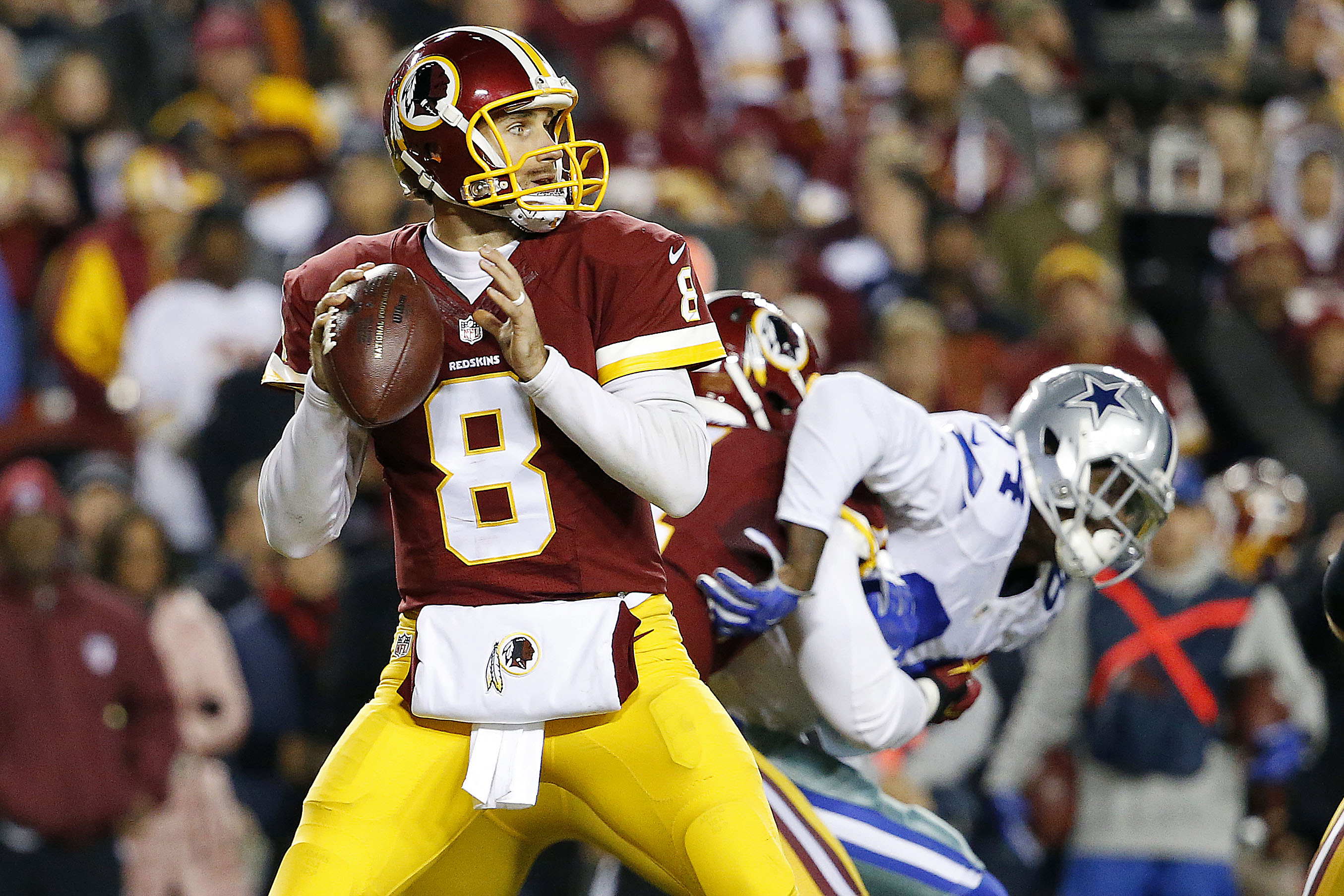 Dallas Cowboys quarterback Matt Cassel (16) walks off the field after  leading his team to a 19-16 victory over the Washington Redskins at FedEx  Field in Landover, Maryland on Monday, December 7