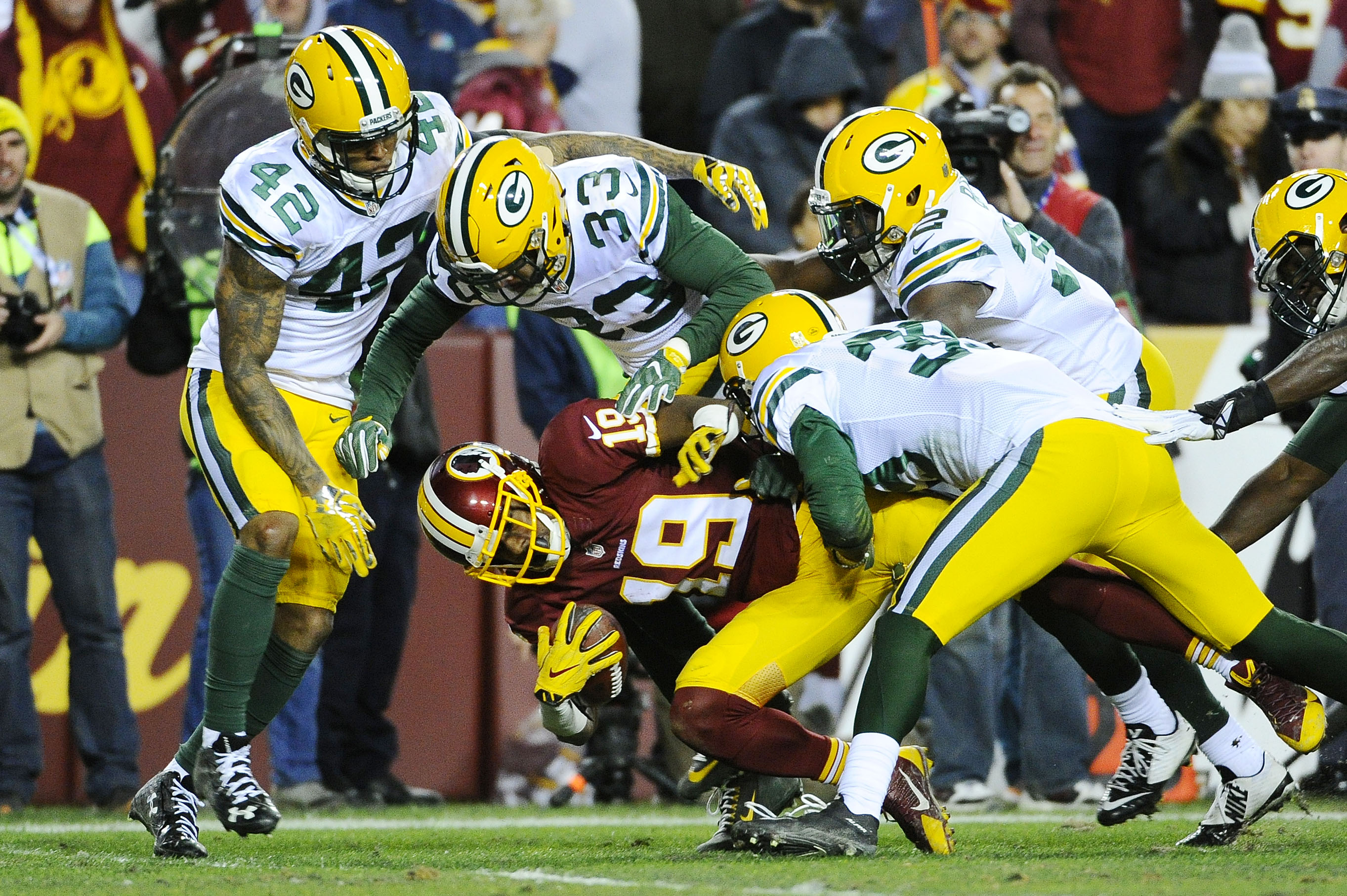 After slow start, Rodgers, Packers overwhelm Redskins 35-18